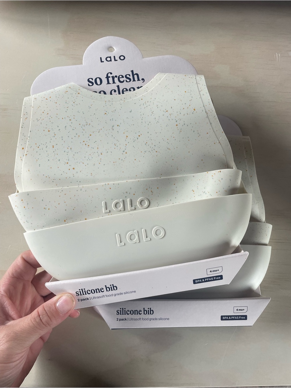 LALO Silicone Bib Set in oat and speckle tan - 2 Pack and 2 sets